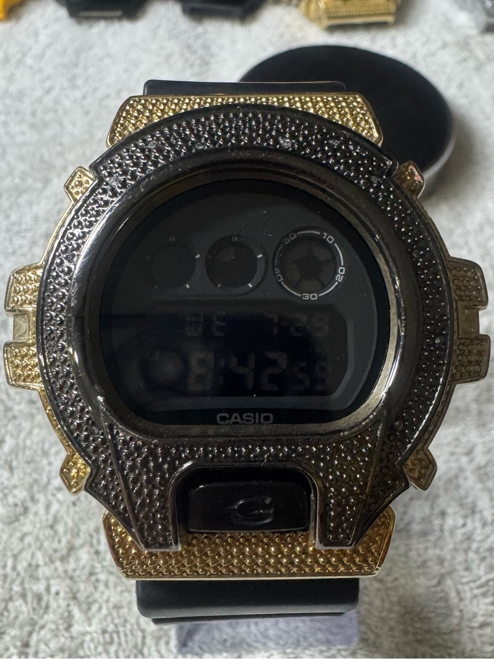 Casio Digital Watch with Black Strap and Gold-Tone Bezel